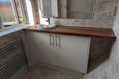 Replace worktop, basin and tap in an ensuite bathroom
